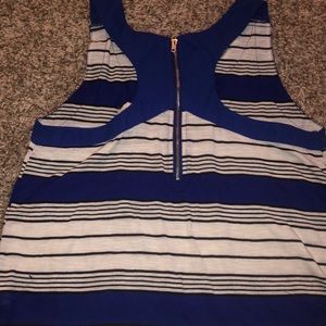blue, white, and black striped tank top